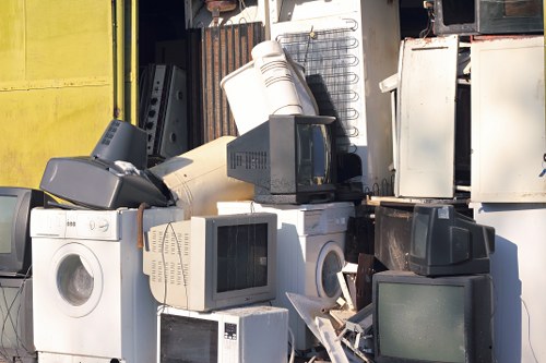 Workers managing construction debris efficiently